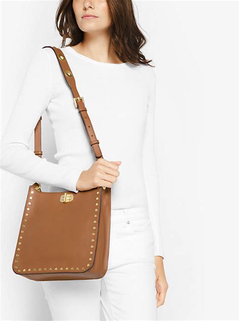 michael kors sullivan medium leather messenger|Michael michael kors jenkins stud sullivan medium north south .